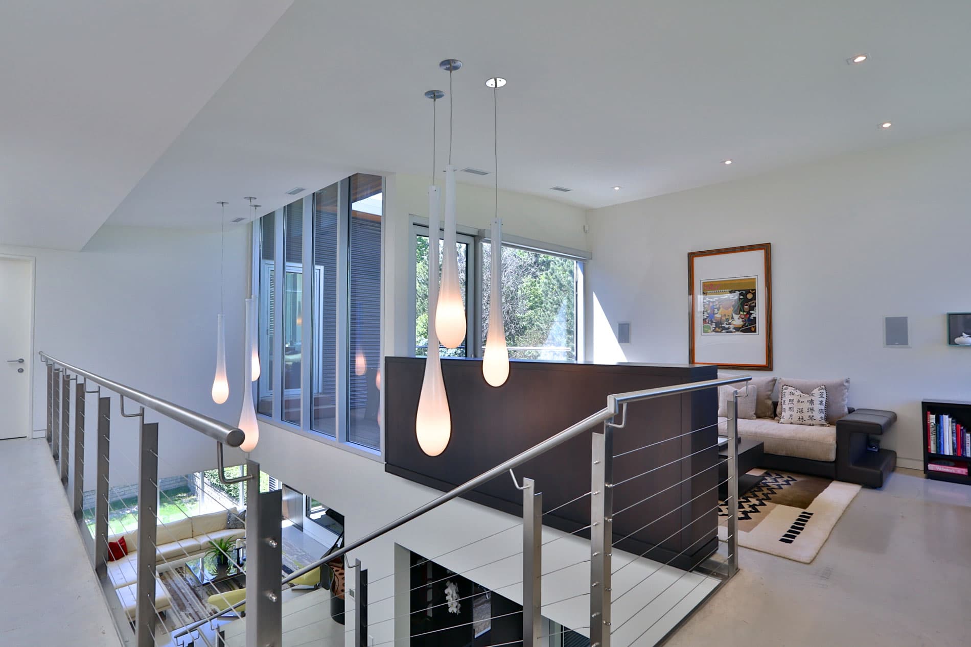 Modern home interior with dramatic pendant lights