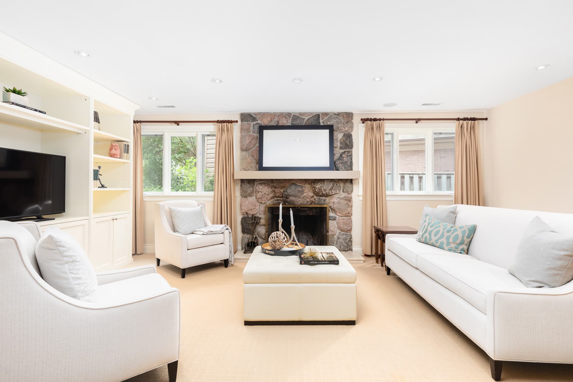 Elegant living room with stone fireplace
